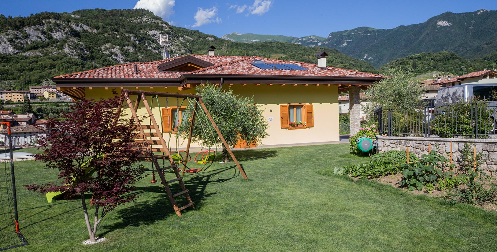 La Giostra di Michelotti Luca | La Giostra Apartments in Drena, in a quiet area surrounded by greenery.